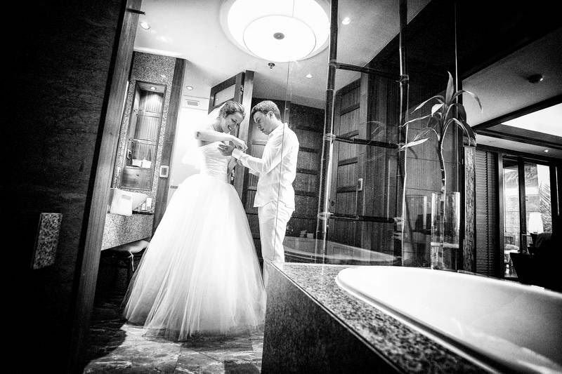 Koh Lipe elopement photography, bride and the groom getting ready in their room before a walk down the aisle to the beach wedding ceremony.